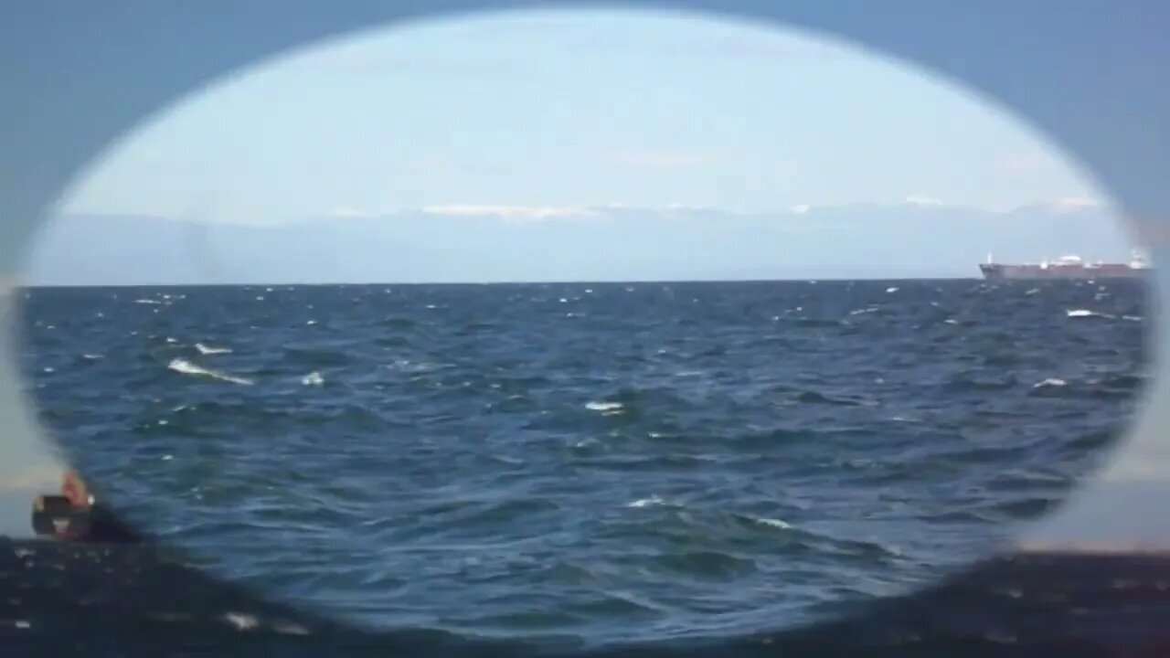 Winter 85 year old female swimmer in the waves in the wind and the bad weather "Barbara"