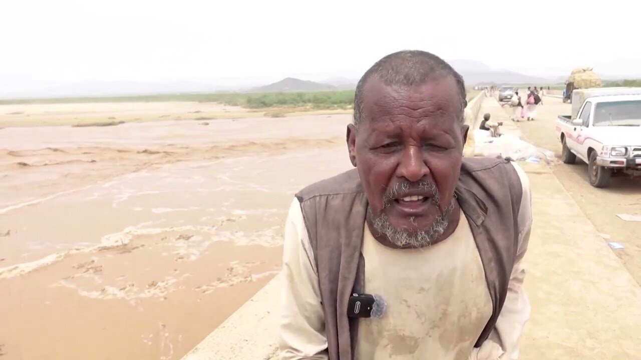 Sudan floods: stranded residents rope-climb to safety | REUTERS