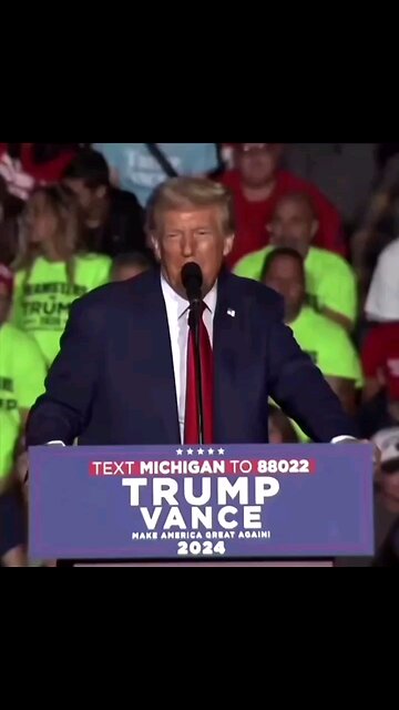 People Mimic Slitting Trumps Throat In Background At Trump Rallys