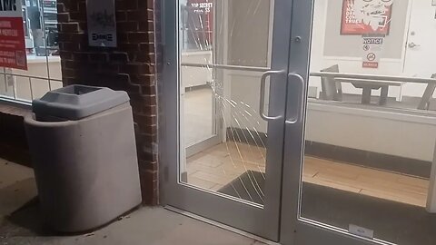 Boston police investigate customer breaking glass at the KFC