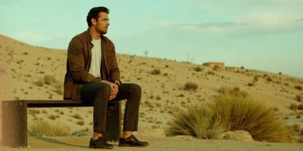 Alone man at the desert.
