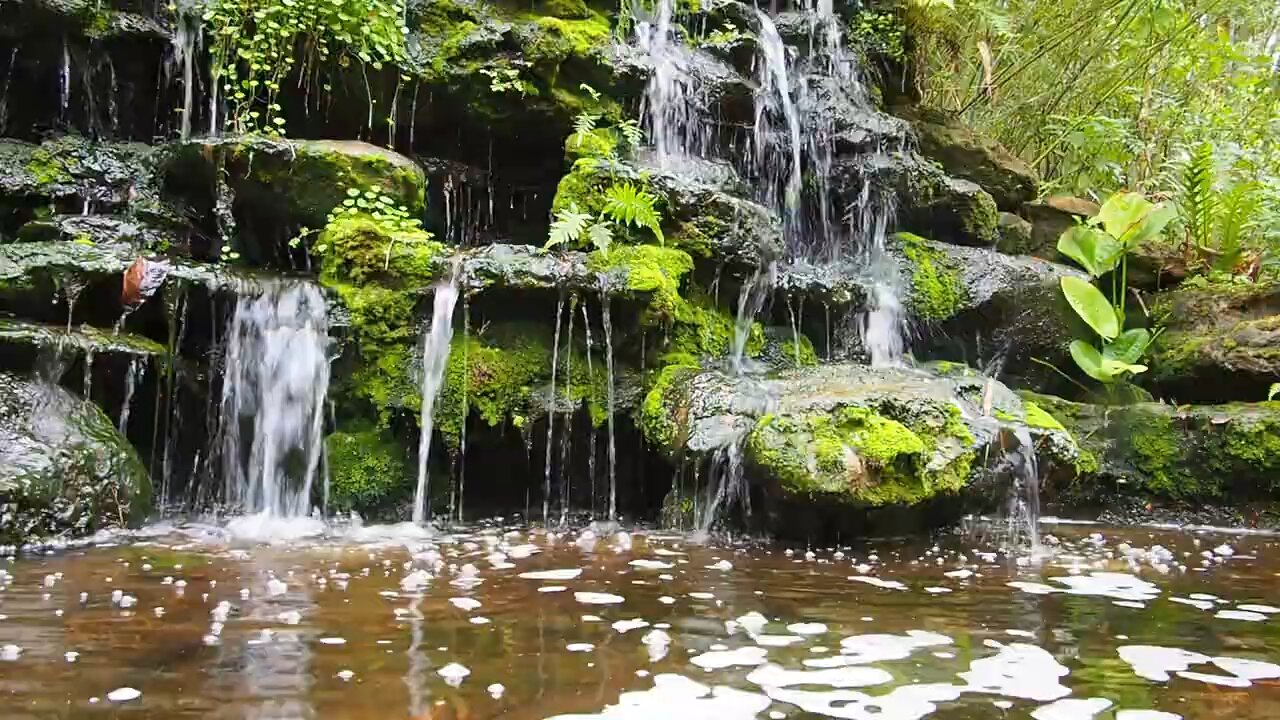 Water flows across the rocks,the beauty seems to make time stop....