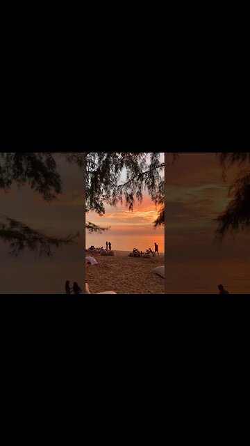 Bright sunset on a cozy evening beach in Phuket