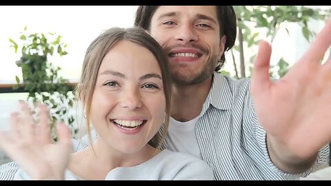 happy couple waving hands looking at camera SBV 338606584 HD