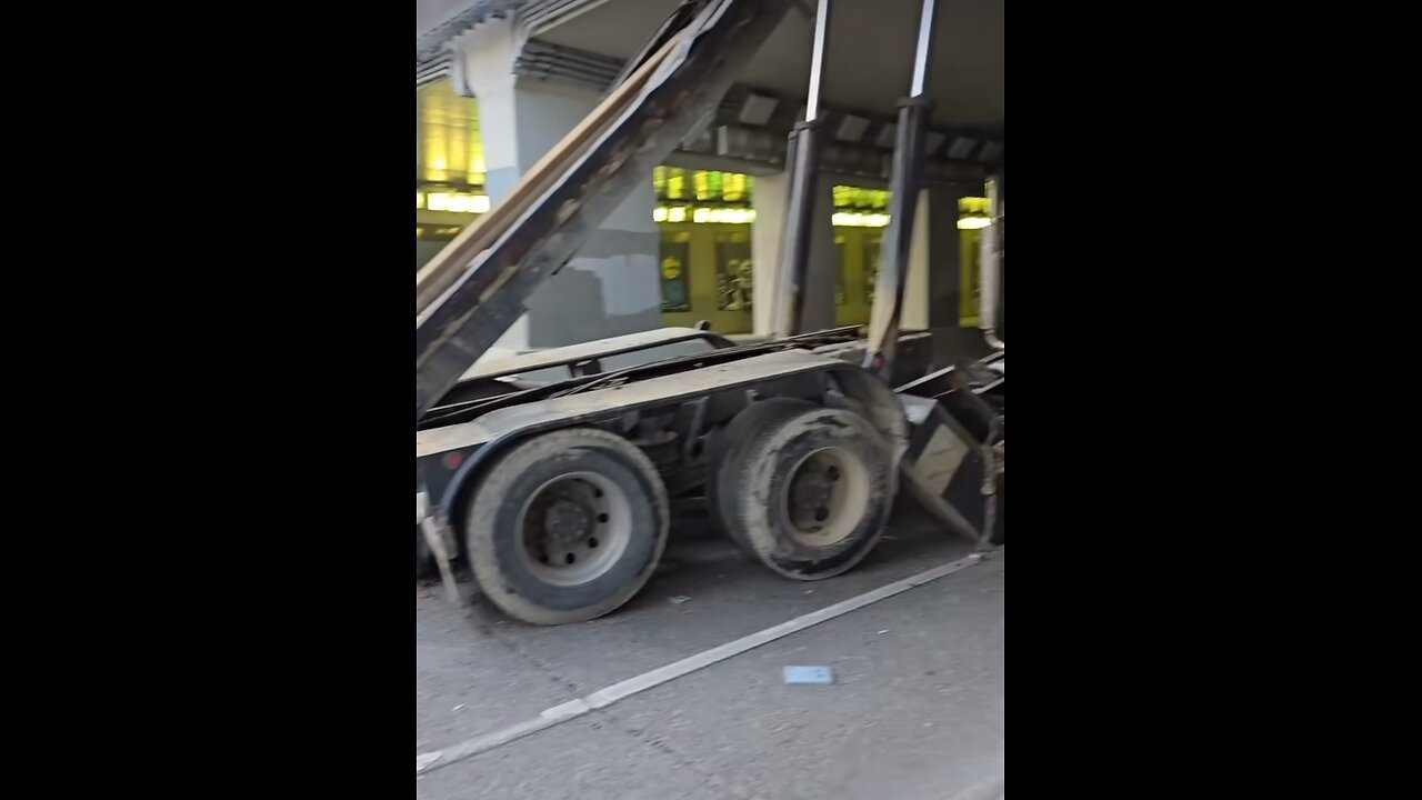 Dump Truck Hits Bridge In Toronto