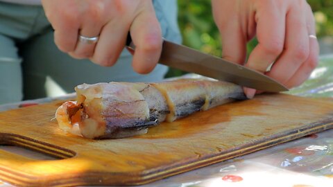 The girl cooks me an amazing fish recipe. How to cook delicious fish