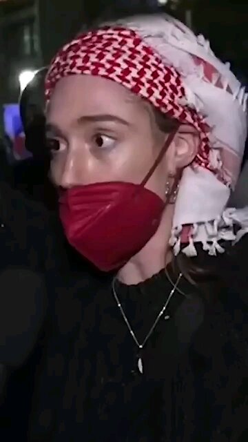 Idiocy: Woman at NYU "protesting" isn't even a student. Can't answer why they're wearing masks