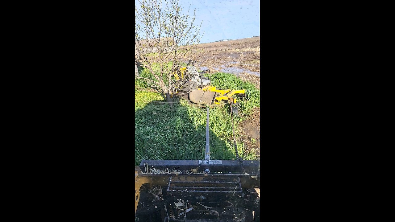 Stuck! Mower and skidsteer in the mud!