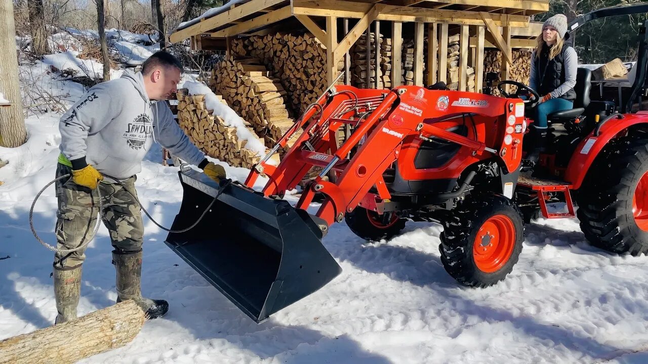 Pulling Firewood Logs with the Kioti CK2610 Tractor