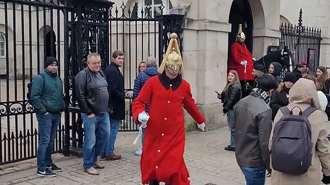 Tourist look on as as guard shouts make way #horseguardsparade