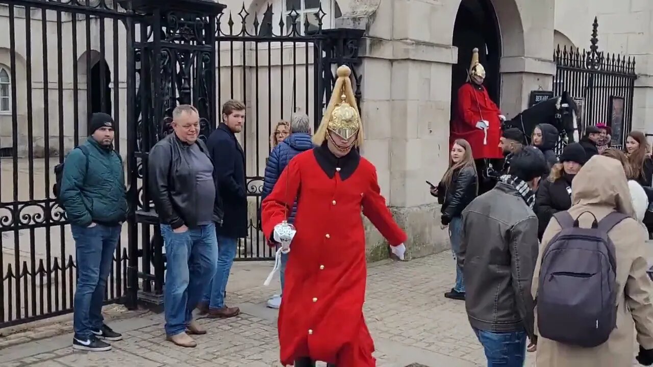 Tourist look on as as guard shouts make way #horseguardsparade