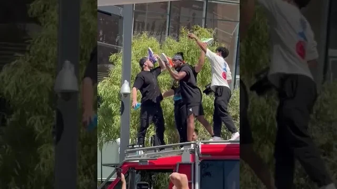 Tai doing shoeies of Prime with KSI and Logan Paul before stylized weigh ins