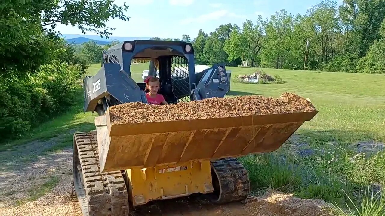 Proud father - 9-Year-Old Daughter Operating John Deere Skid Loader - Home school Lesson