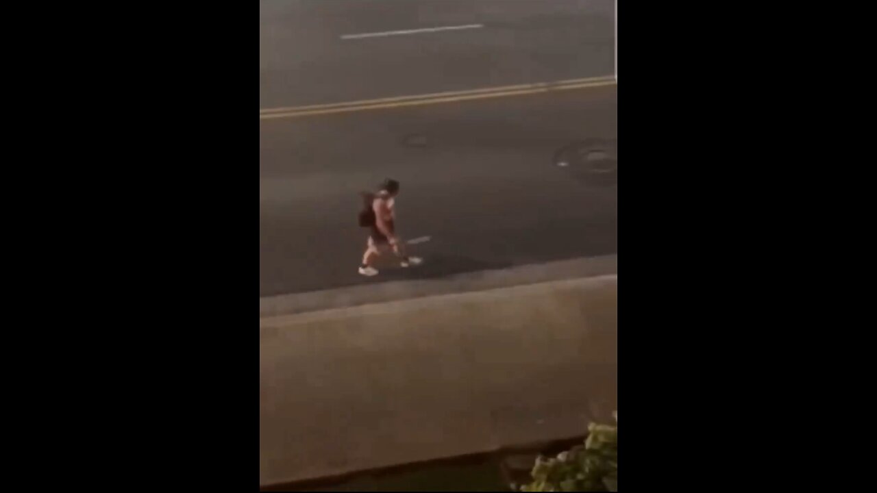 Man wielding a machete is struck by a car and beaten up