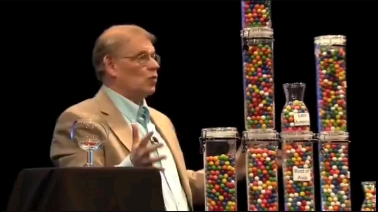 Mass Immigration Is Genocide, demonstrated with gumballs