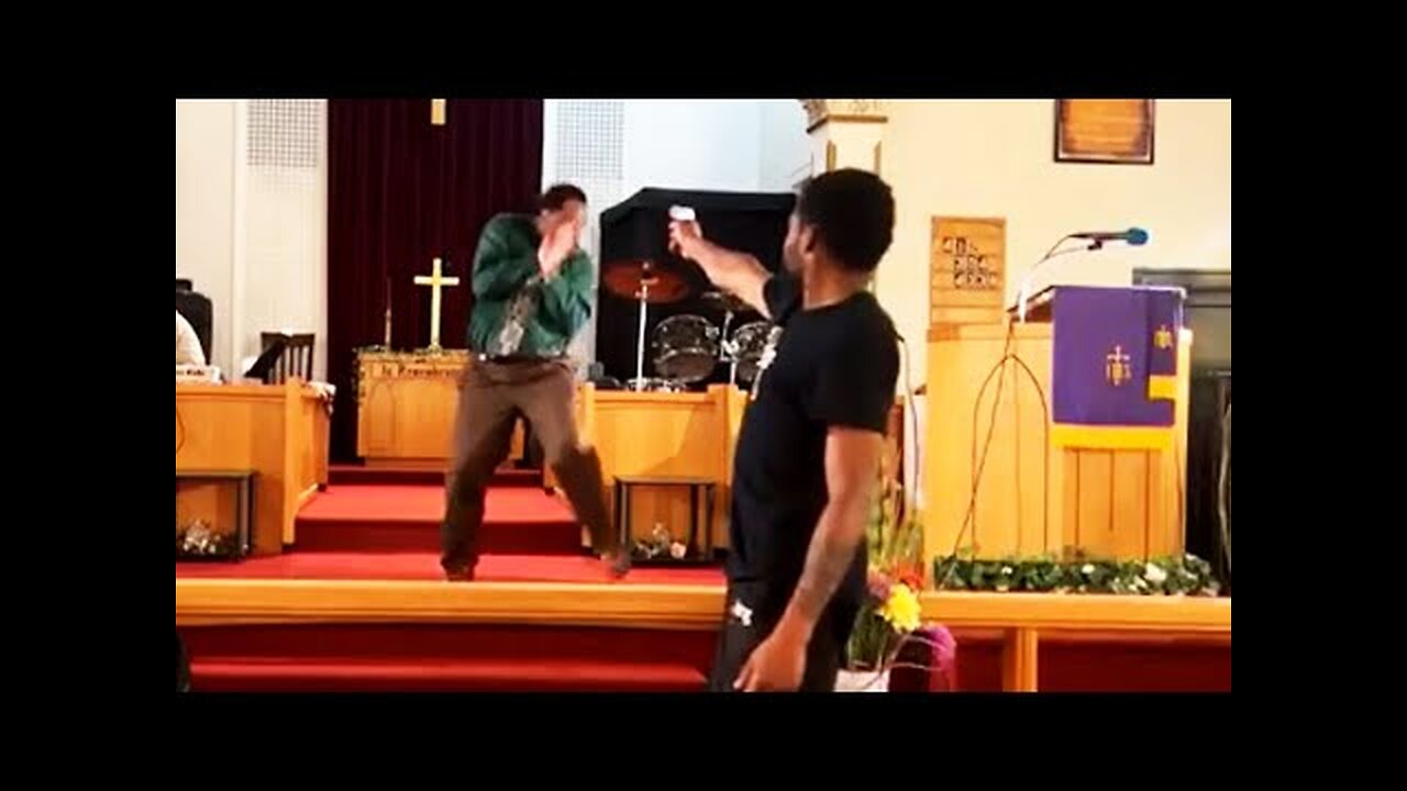 Man Points Gun at Pastor During Church Service