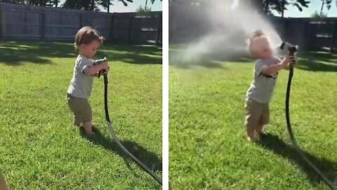 A baby play with water pipe And spray the water on the face