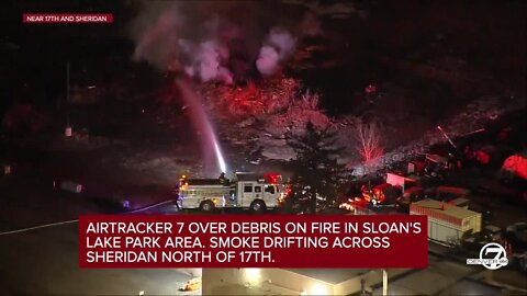 RAW: Brush pile fire at Sloans Lake