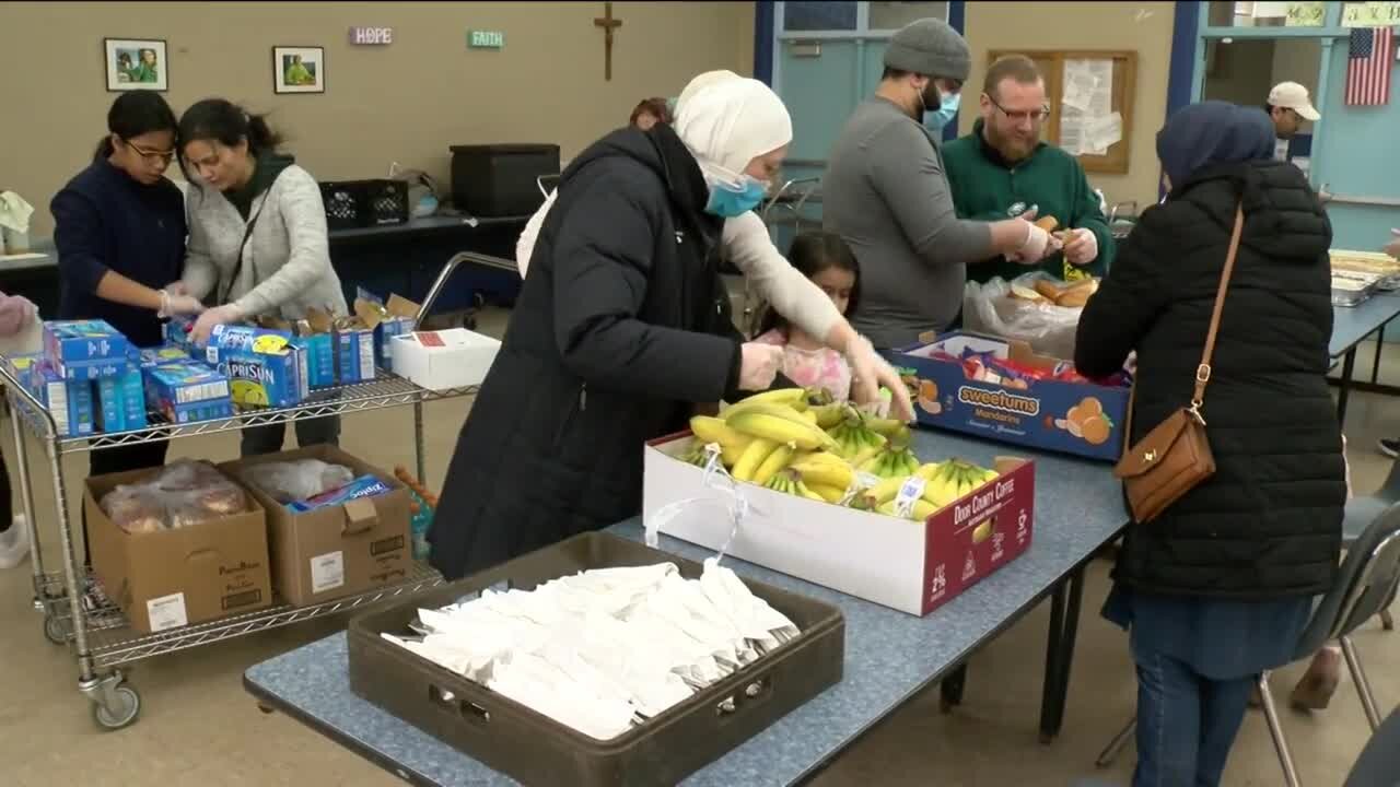 Serving food to the homeless on Super Bowl Sunday