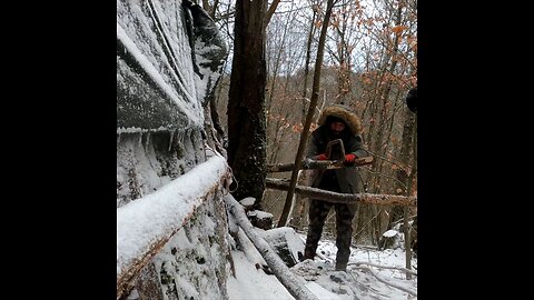 Winter snow camping in the wilderness and outdoor cooking