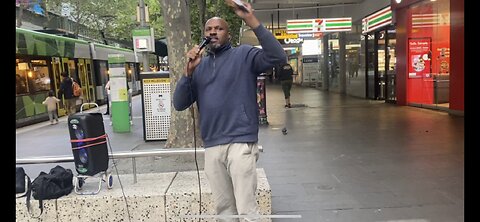 Brother Eguavon spreading the gospel on the streets of Melbourne.