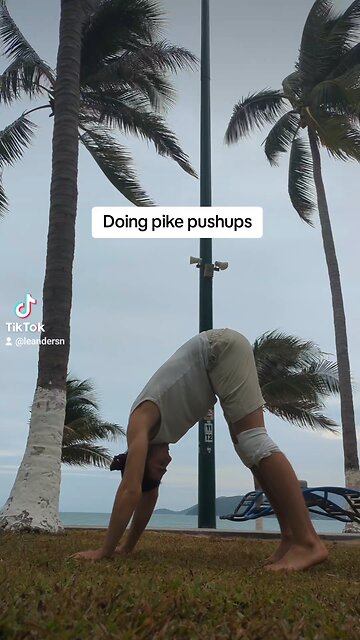 Doing pike pushups