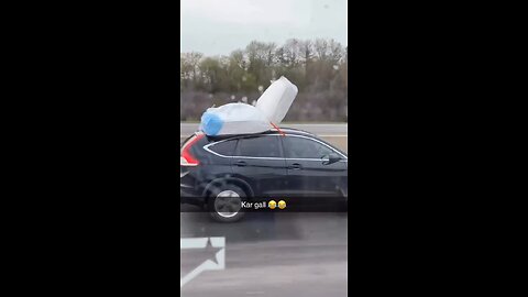 Mattress Falls Of Car On Highway