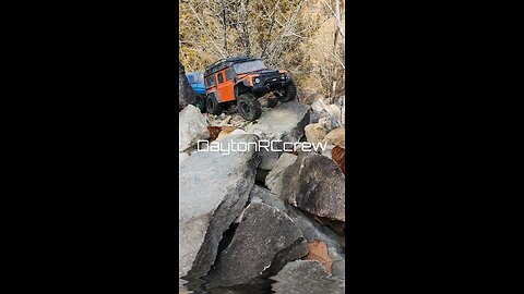 Trx4 Defender dropping in off rocks