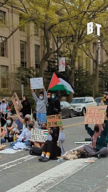 High school students have blocked off Mass Ave in Cambridge