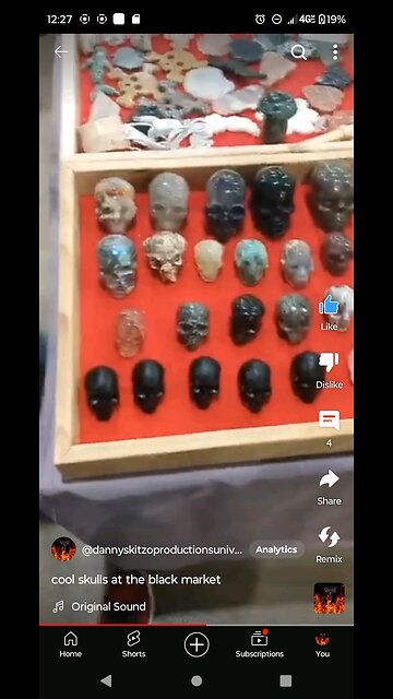 conniving lady tries to sell me extremely expensive rock skulls at the black market