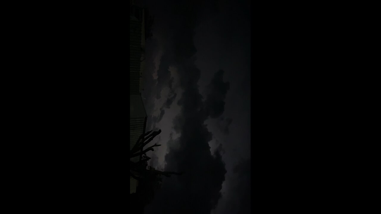 Check out the silhouette- distant, intense lightning