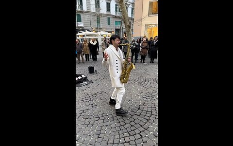 A man playing the saxophone