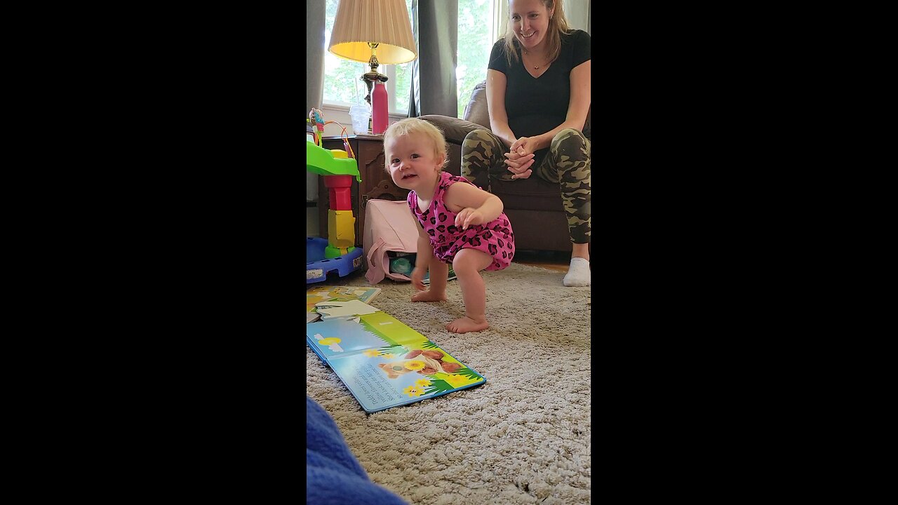 10 month old finally stands by herself