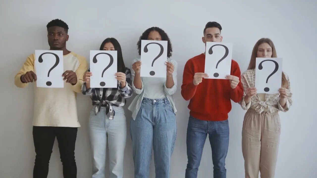 youth and social problems group of young serious diverse people holding question ma SBV 346726553 HD