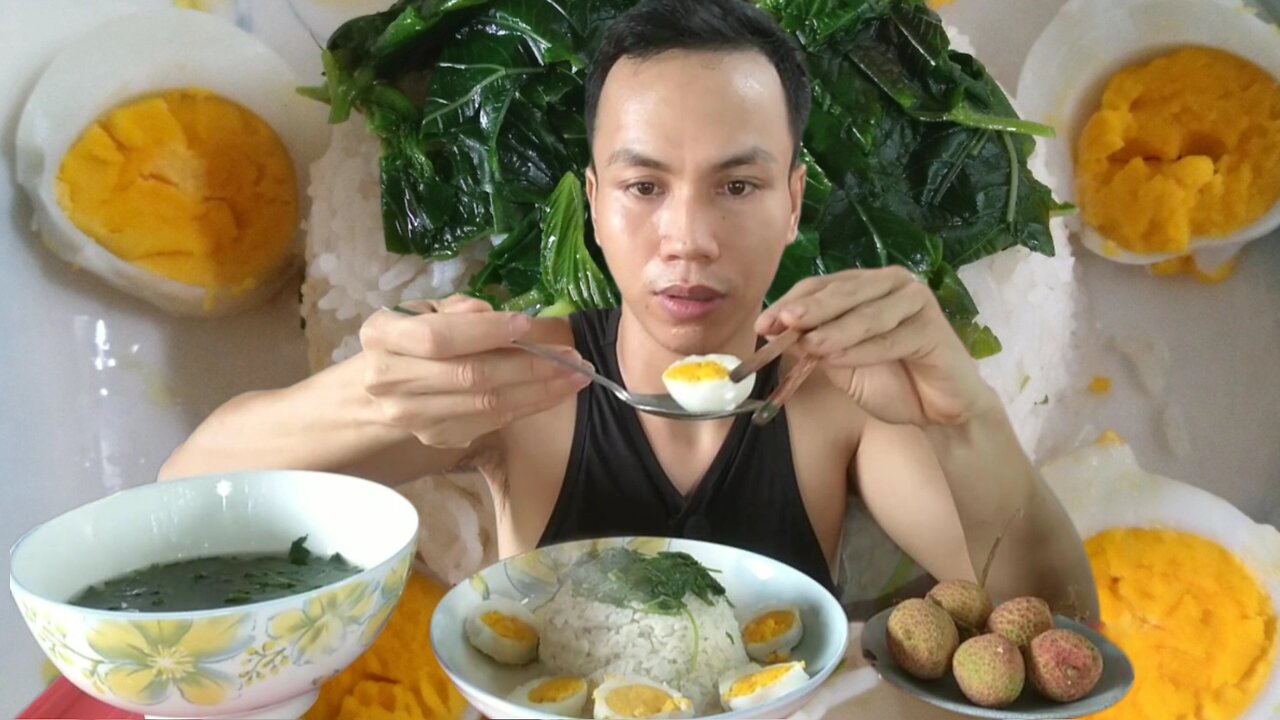 boiled egg rice with jute vegetables for dessert with lychees and a cup of cereal water