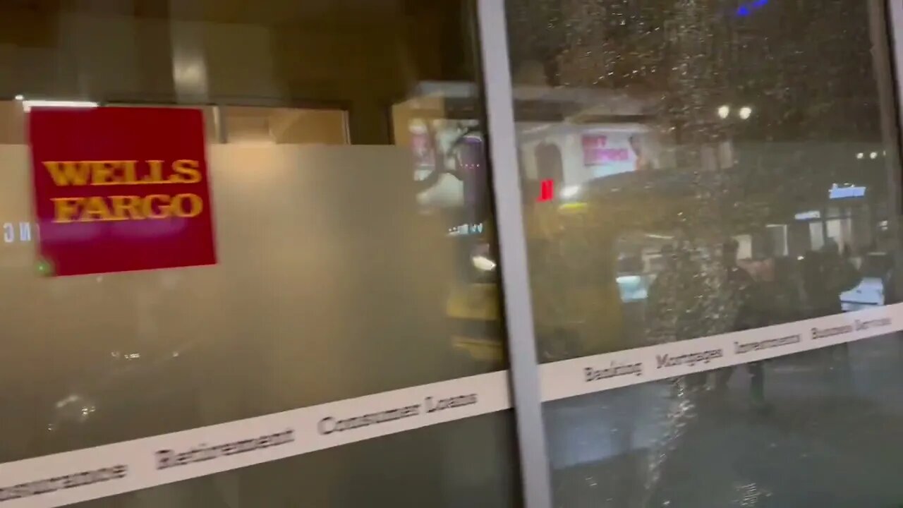 Wells Fargo’s windows spray painted with “fuck cop city”