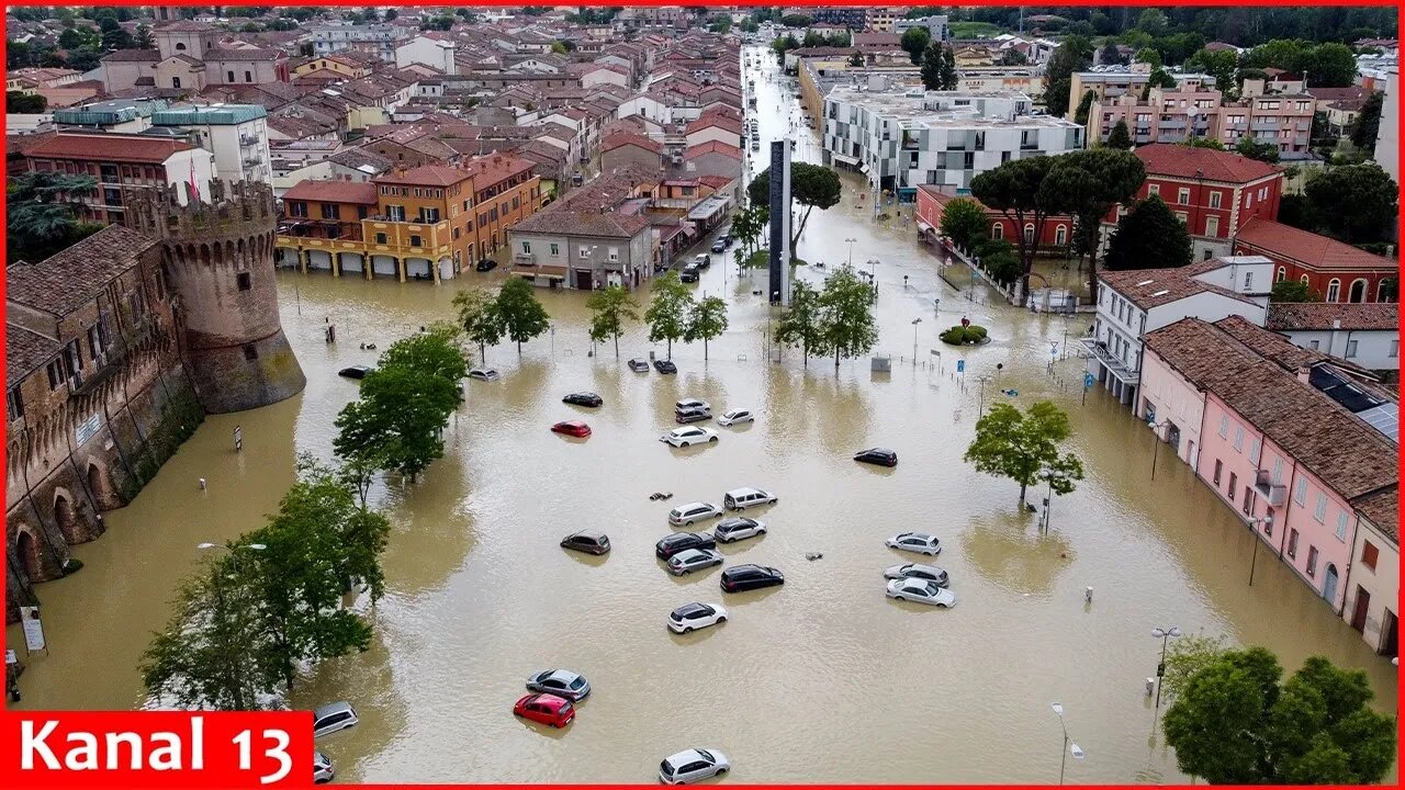 Stranded people airlifted from roofs in flooded areas in Italy