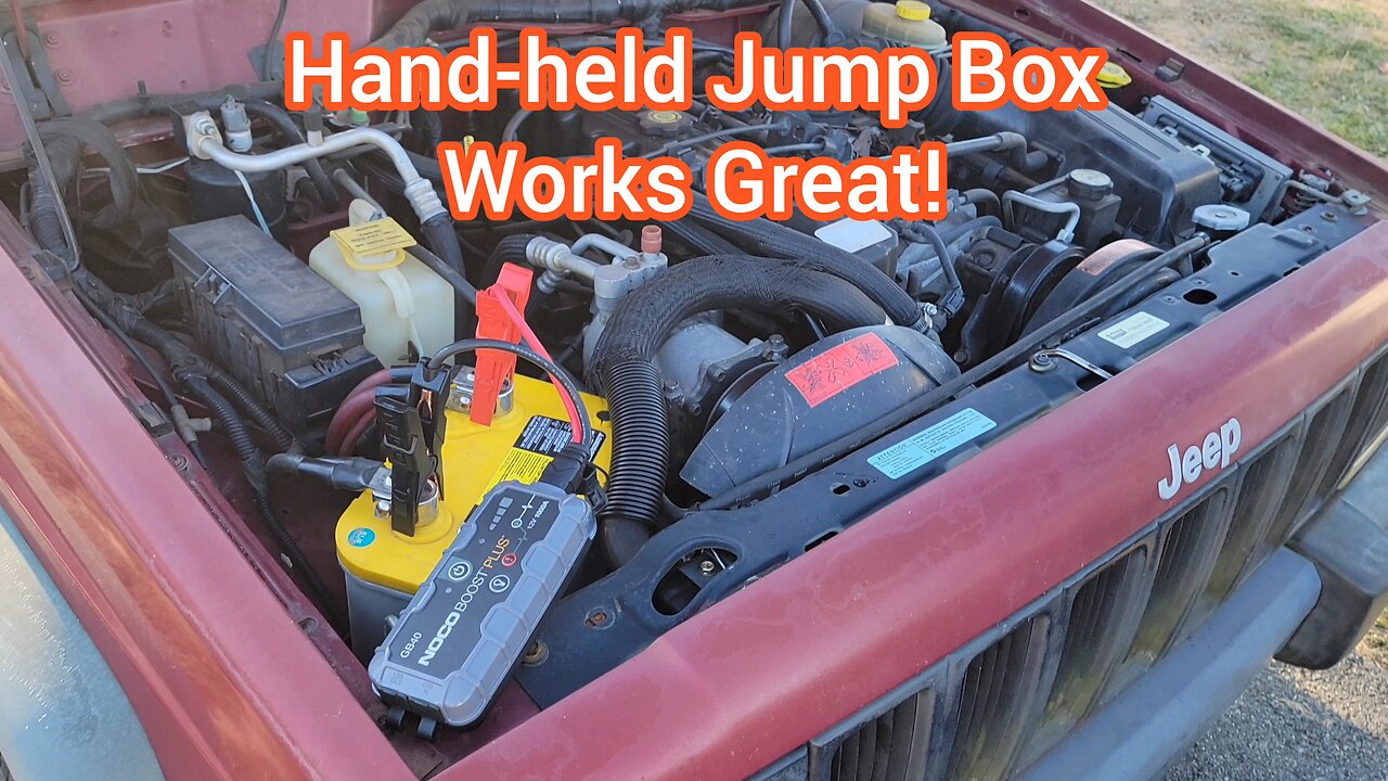 Jump Starting My Jeeps Dead Battery Using A Small Portable Jump-Pack To Get To Work