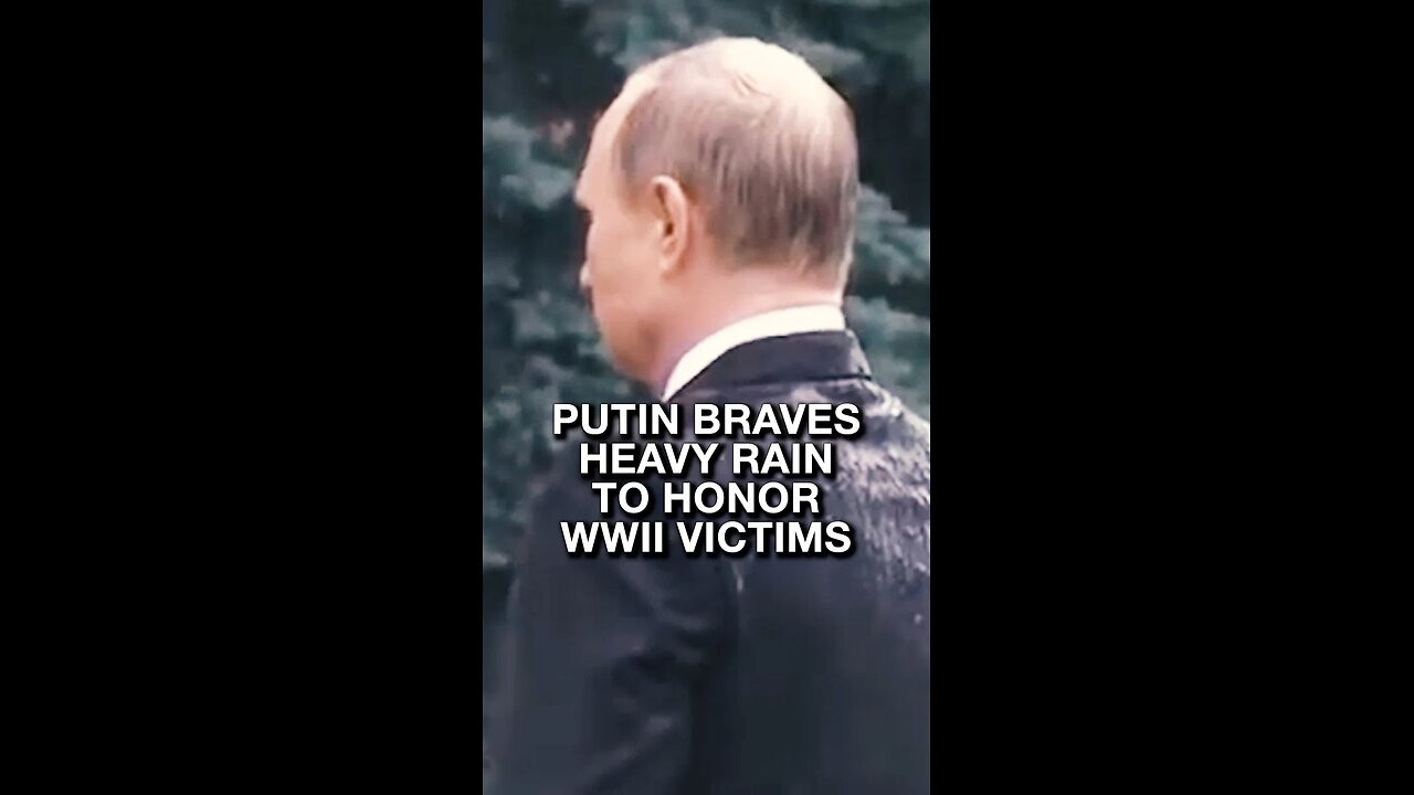 Putin braves heavy rain to honor WWII victims