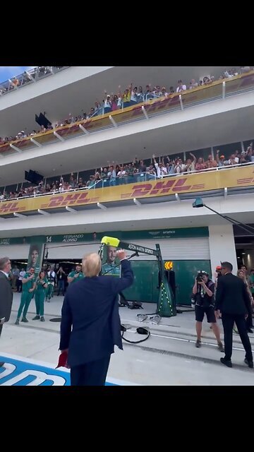 Trump Walks Out To A Huge Welcome At Formula One With USA Chants