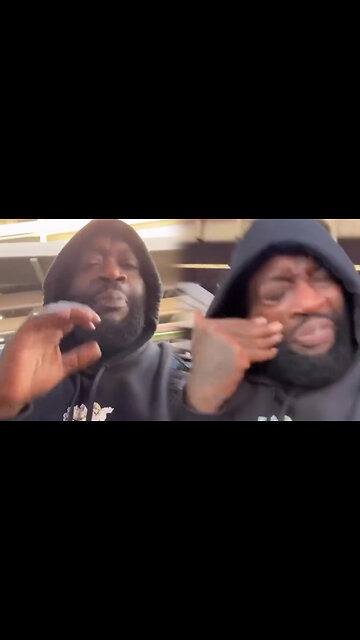 Rick Ross tucks his chains in after his plane had to make an emergency landing
