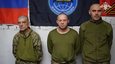 Russian soldiers from the 5th brigade raise the Russian flag in Kurakhove.