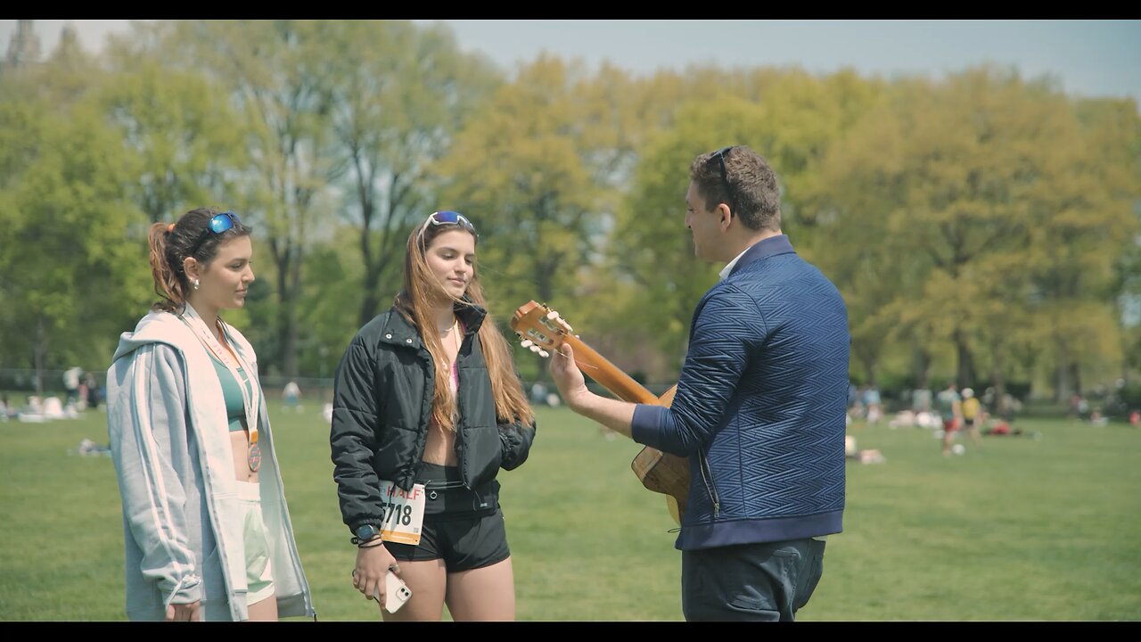 Singing “Let Me Love You” to cute girls in the park