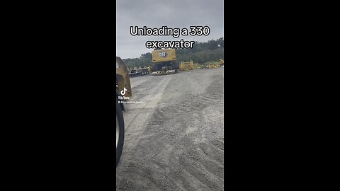 Unloading a 330 Excavator