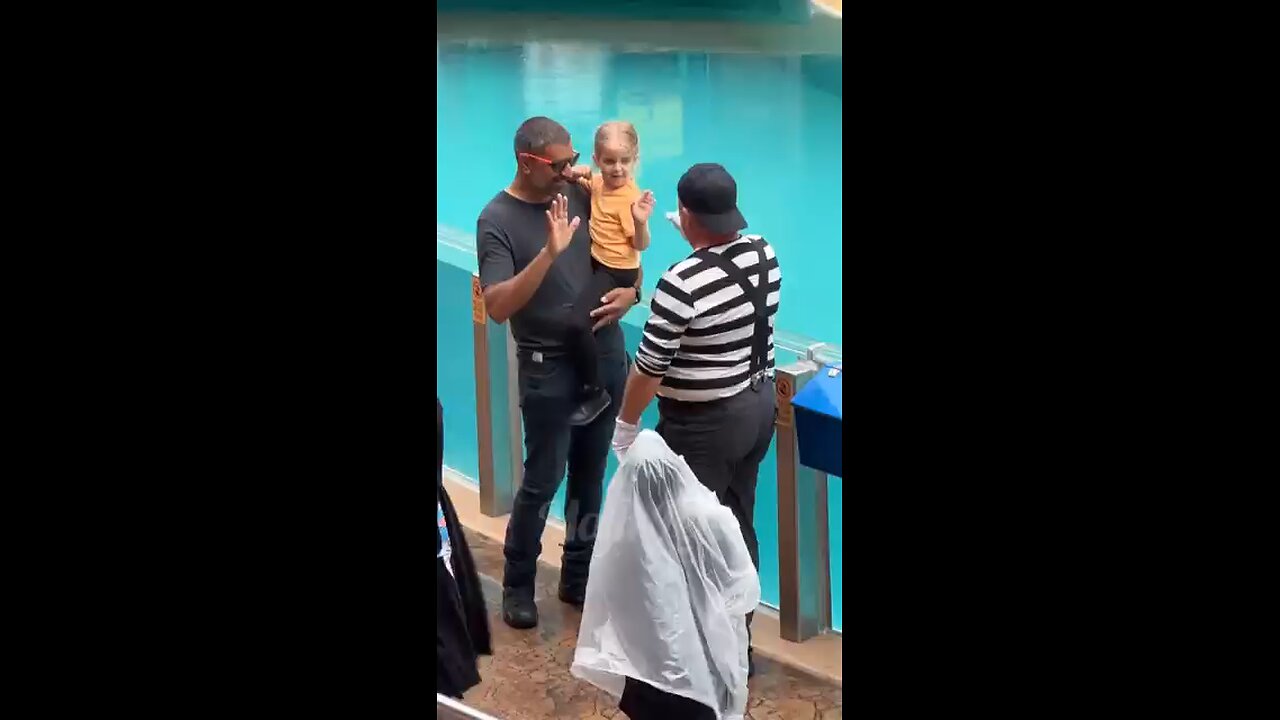 Tom and kids giving high five to eachother