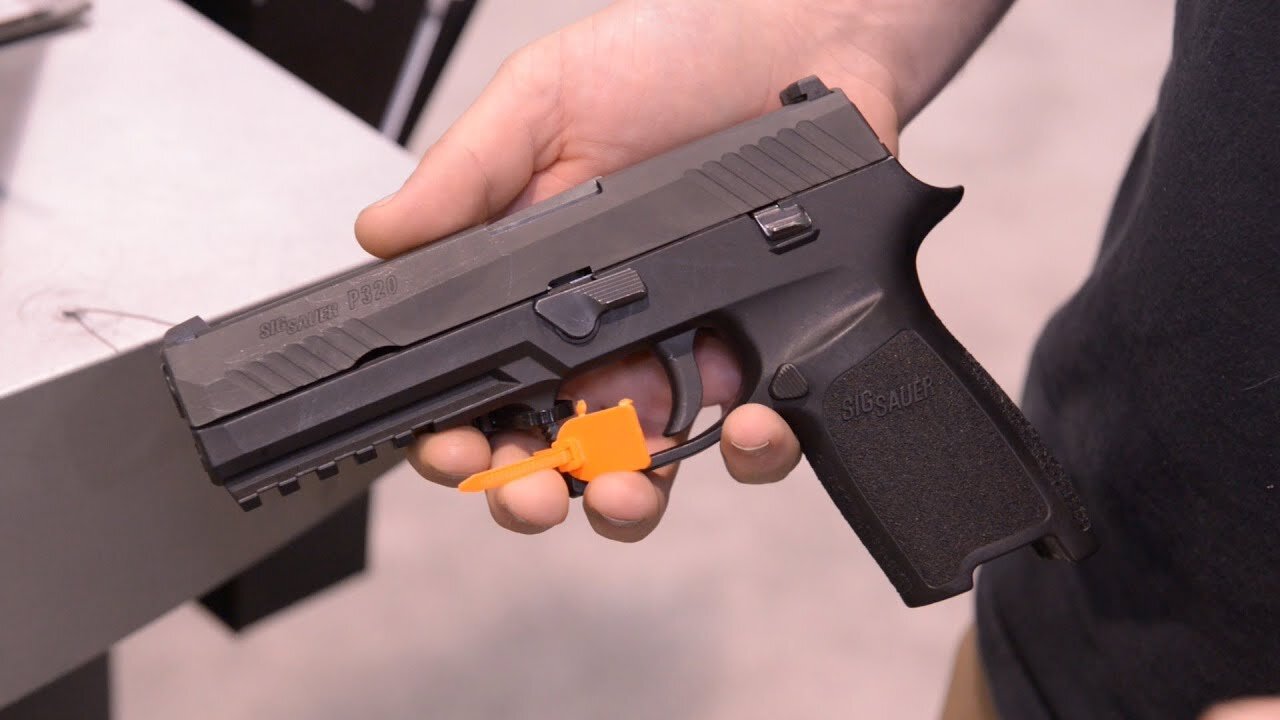 SHOT Show 2014: SIG P320 & SIG556XI