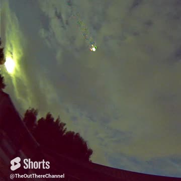 Plane captured on Sony night color camera 180 fisheye lens can see red & green flashing wing lights