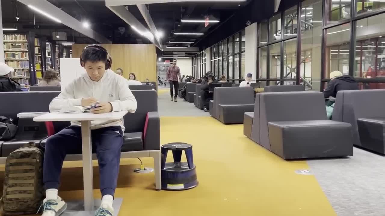 Blasting Andrew tate videos on library prank