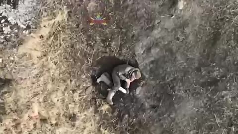 Injured Russian Soldier Freezing to Death in a Hole