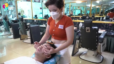 foot, hand, and head massage service in the barbershop with two beautiful girls